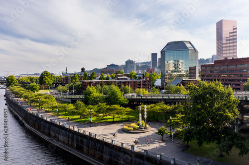 USA, Oregon, Portland. The view of downtown with waterfront park from the Steel Bridge. © Brent Bergherm/Danita Delimont