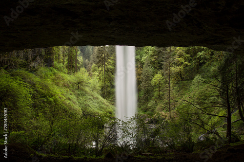 USA, Oregon, Silver Falls State Park. North Falls seen from inside cave.  photo