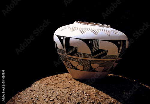 USA, New Mexico, Pueblo de Taos. This graceful pottery vase is typical of the art work found at Pueblo de Taos Indian Reservation, New Mexico photo