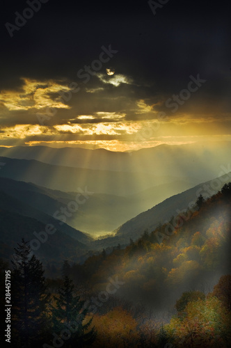 USA, North Carolina, Great Smoky Mountains. Sunrise light beams flood mountains and forest in fall colors. Credit as: Nancy Rotenberg / Jaynes Gallery / DanitaDelimont.com