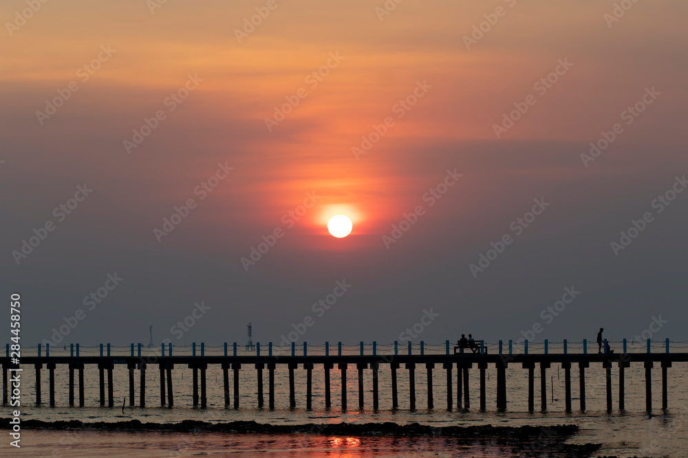 Obraz premium Sunset on the sea Sunset sea landscape nature bridge Beach by the sea