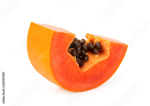 sliced ripe papaya fruit isolated on white background