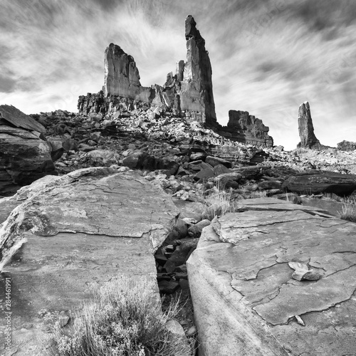 Usa, Utah, Canyonlands National Park. Black and white image of Zeus and Moses, rock formations with clouds. photo