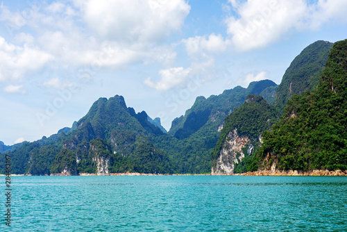 Limestone mountain range and turquoise lake in Thailand © oppdowngalon