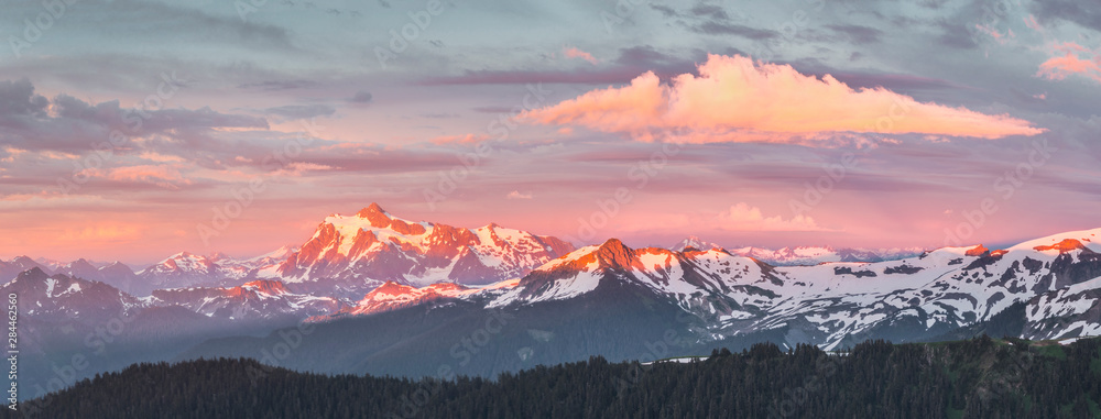 USA. Washington State. Panorama of Mt. Shuksan, Lasiocarpa Ridge and north Cascades from Skyline Divide at sunset.