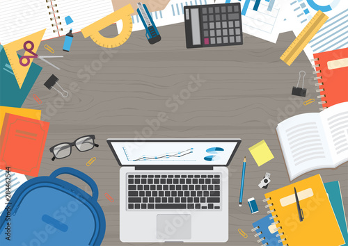 Wood textured desk from top view, with laptop computer, backpack, stationery, glasses, calculator, book, folder, document and school notebook in flat design 