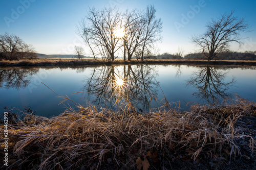 USA  Washington State  Walla Walla County. Whitman Mission National Historic Site  Mill pond reflects the sunrise.