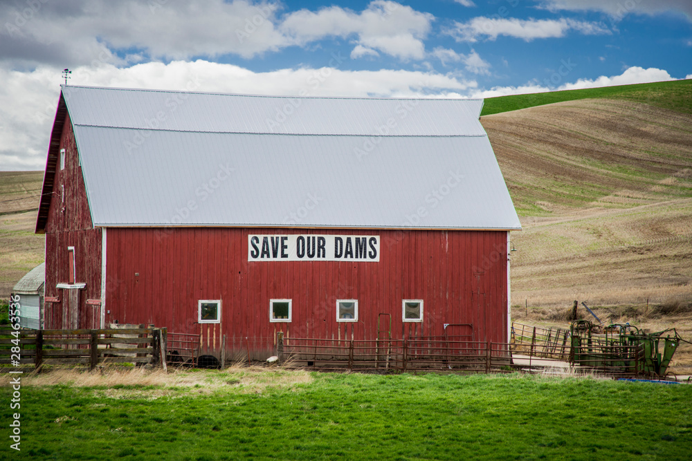 USA, Washington State, Whitman County, The Palouse, near Lacrosse, barn with sign for 'Save Our Dams'
