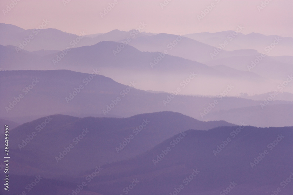 USA, Washington, Mount Rainier National Park. Scenic of layered hills in fog from Tolmie Peak. 