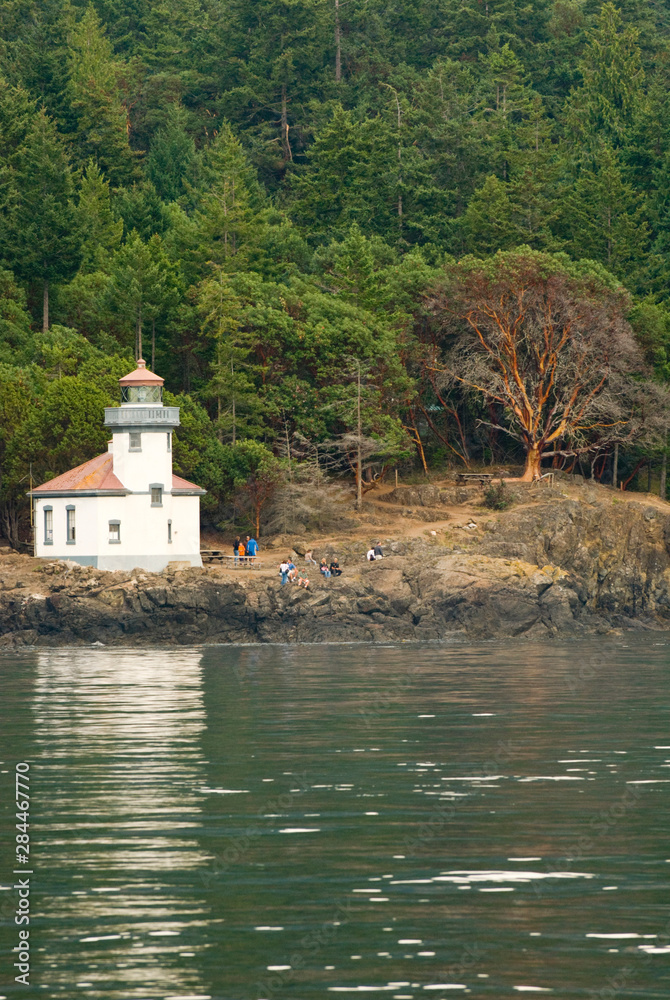 USA, WA, San Juan Islands. Lime Kiln Lighthouse is an active navigational aid located in Lime Kiln Point Park. Favored spot for viewing Orcas in Haro Strait.