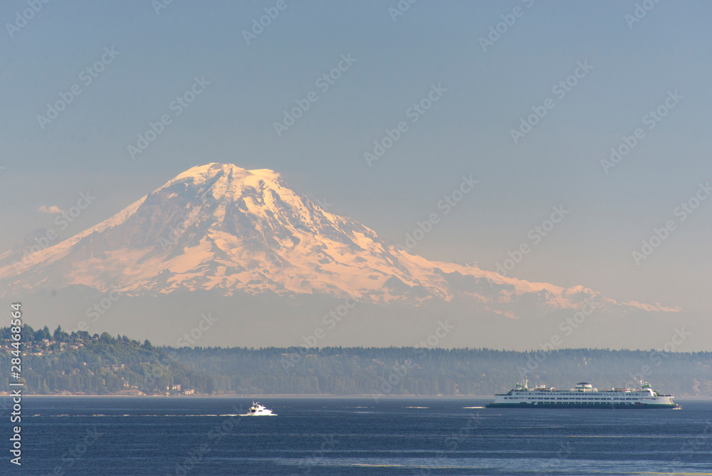 USA, Washington State, View of Mount Rainier beyond West Seattle and Alki Beach.