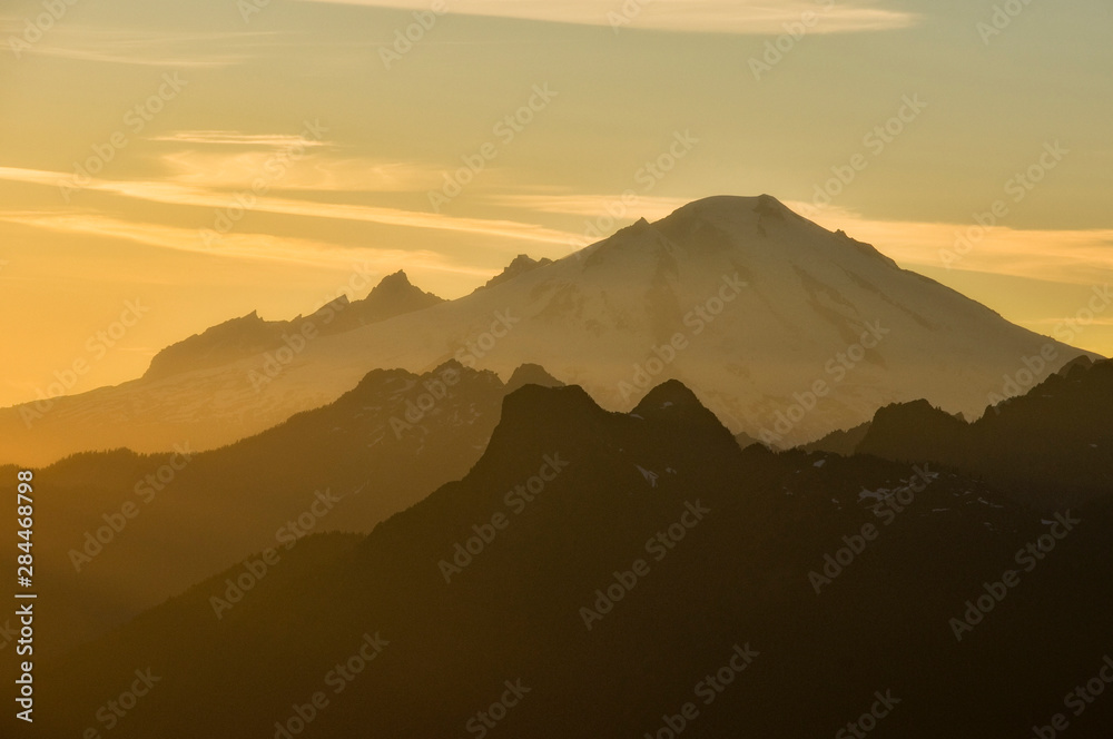 USA, Washington State, North Cascades. Mount Baker at sunset, as seen from Lookout Mountain summit.