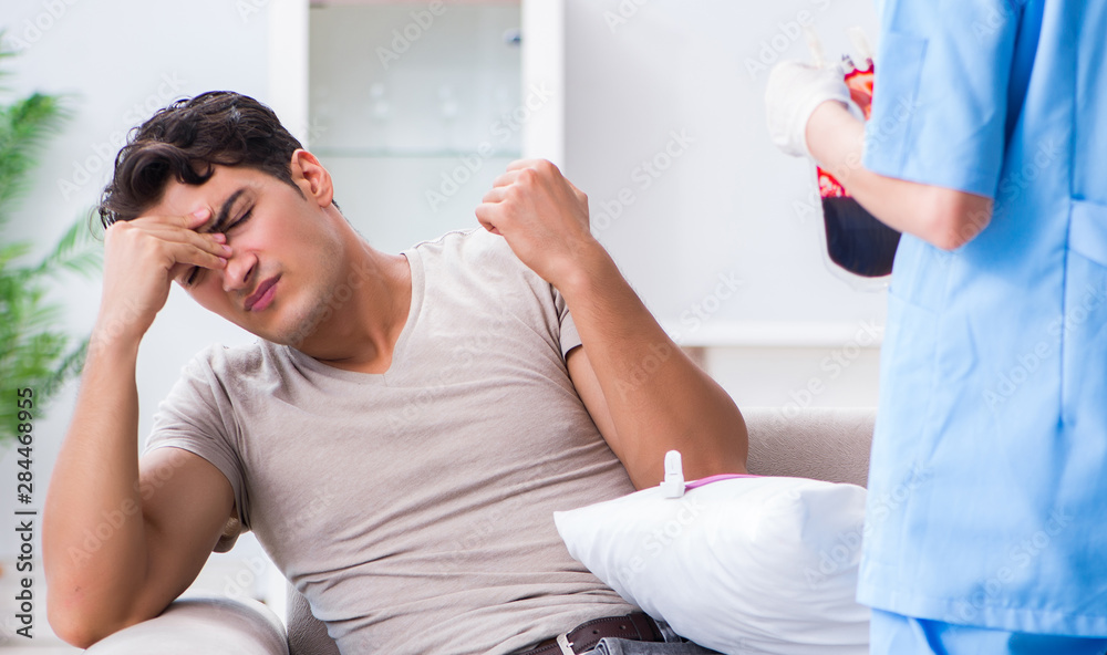 Fototapeta premium Patient getting blood transfusion in hospital clinic