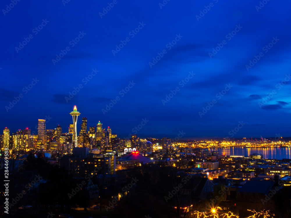 USA, Washington State, Seattle, Night View of Seattle Skyline with Christmas Tree on the Space Needle