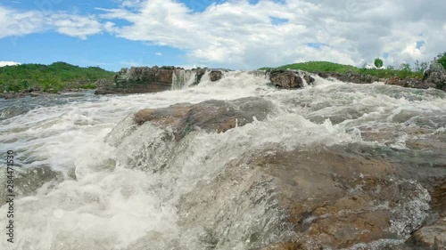 River and rocks in a waterfall, low angle view ina close up, real time shot, Brazil park Chapada dos Veadeiros