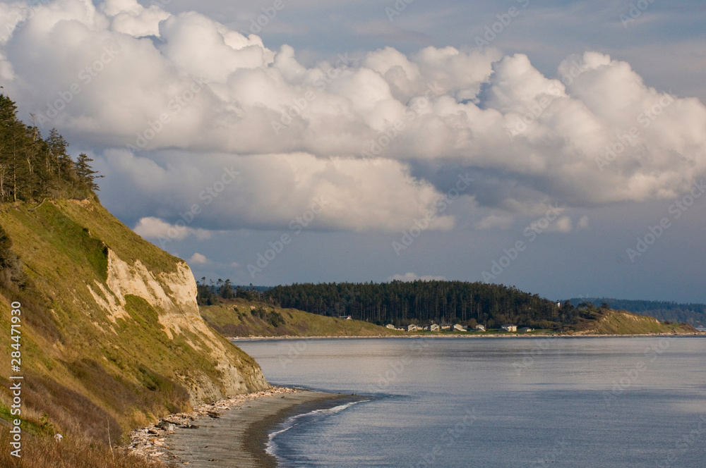USA, WA, Whidbey Island, Ebey's Landing NHR. Expansive vistas from Ebey's Bluff along Strait of Juan de Fuca and Admiralty Inlet. Buildings of Fort Casey and Admiralty Head Lighthouse.