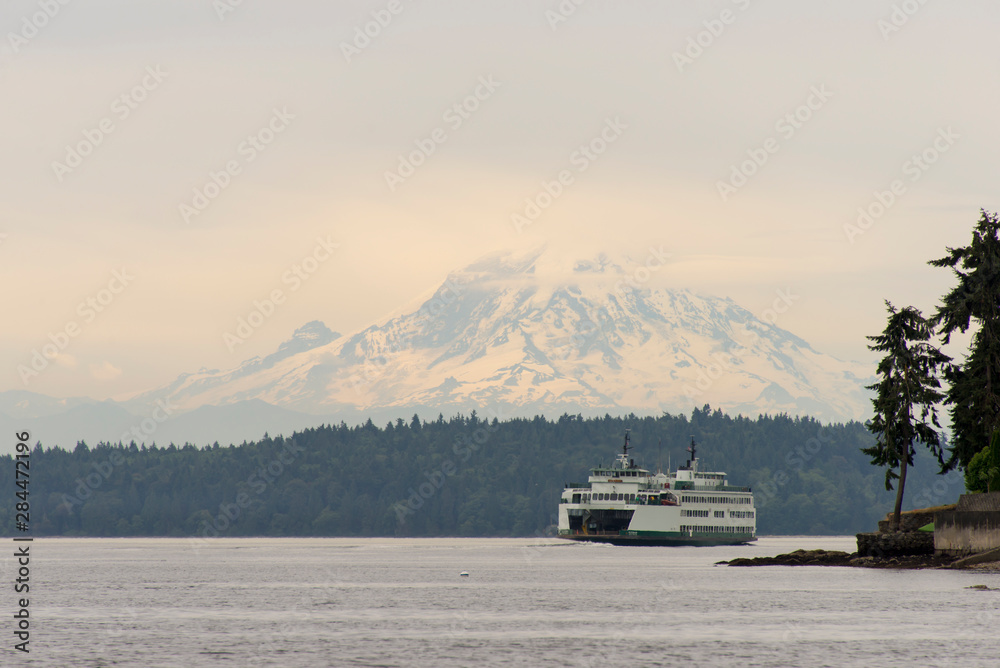 Usa, Washington State, Puget Sound. Seattle-Bremerton ferry with Mt. Rainier cloudy day