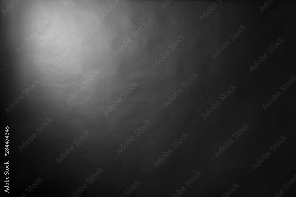 Black screen as background. Professional photo studio interior