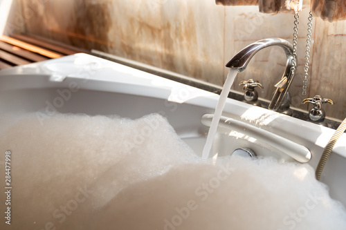 Luxury classic bathtub in bathroom.