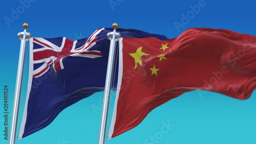 4k Seamless New Zealand and China Flags with blue sky background;A fully digital rendering;The animation loops at 20 seconds;NZL NZ CHN CN. photo