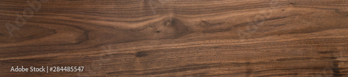 Black walnut wood texture of solid board oil finished