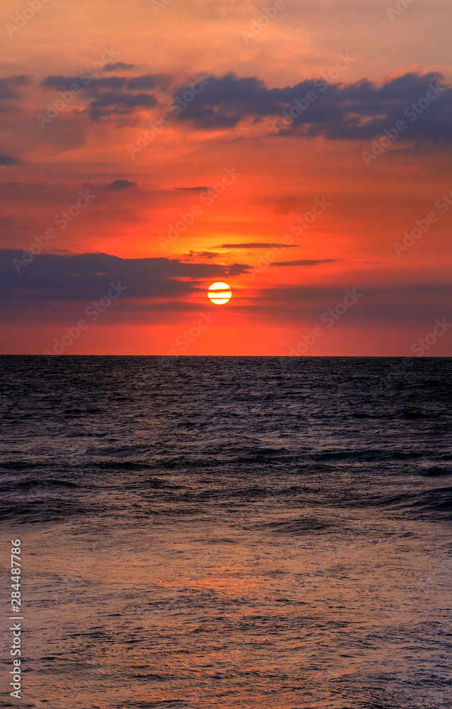 Beautiful sea and red sun rise.