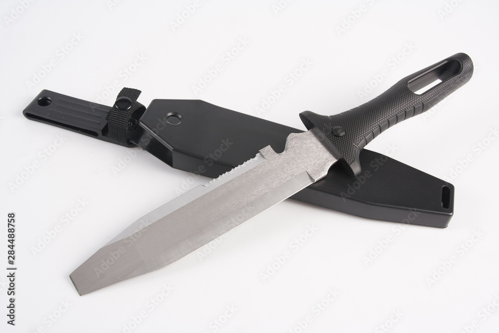 Small knife in leather case. Studio Photo Small knife in leather case. Studio Photo