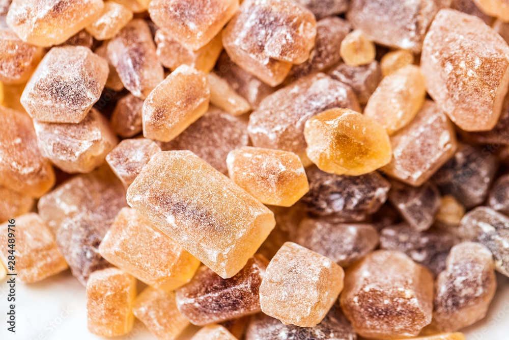 Cane sugar in crystal cubes, fragrant brown sugar for tea and coffee Cane sugar in crystal cubes, fragrant brown sugar for tea and coffee