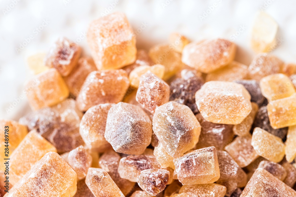 Cane sugar in crystal cubes, fragrant brown sugar for tea and coffee Cane sugar in crystal cubes, fragrant brown sugar for tea and coffee