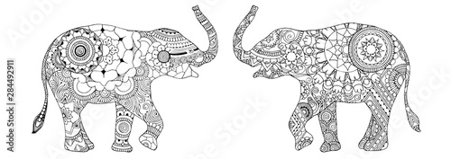 Two elephants on a white background. According to the canons of Feng Shui, the trunk, understood upward, attracts wealth and good fortune. Elephants are decorated in the style of Indian mehndi pattern
