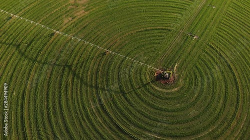 Circular Farming Sprinkler Pattern on Hay Field in Sierra Valley CA - Aerial Drone. photo