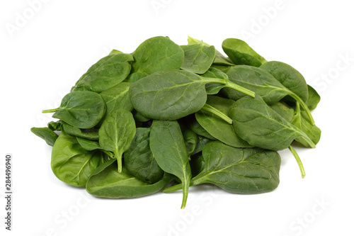 fresh spinach leaves on white background