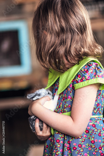 little girl with rabbit