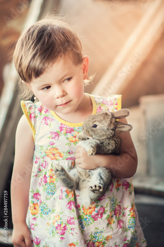 little girl with rabbit