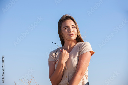 Beautiful Asian woman Smiling happy girl and wearing warm clothes winter and autumn portrait at outdoor in park