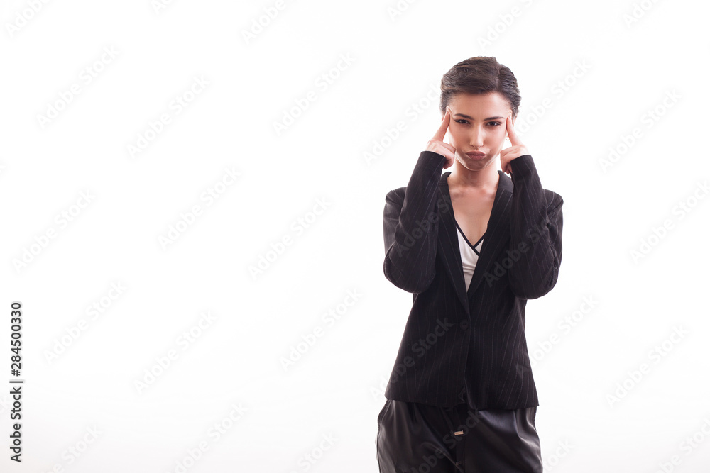 Fashion model with a casual black jacket in studio over white background Fashion model with a casual black jacket in studio over white background