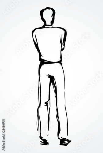 A man stands and looks into the distance. The view from the back. Vector drawing