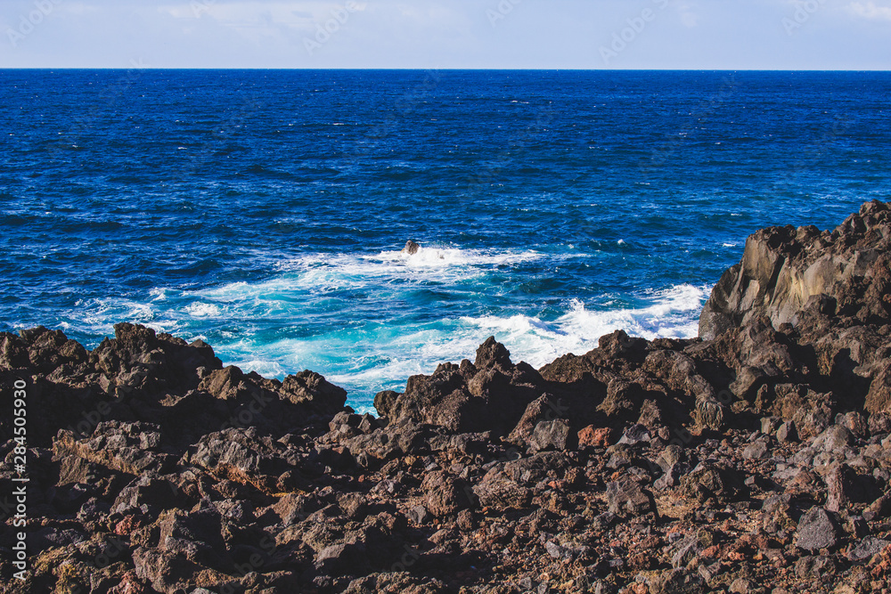 rocky coastline at the west coast of Sao Miguel Island, Azores, Portugal rocky coastline at the west coast of Sao Miguel Island, Azores, Portugal