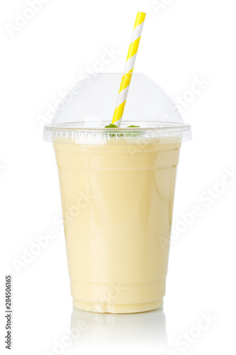 Banana smoothie fruit juice straw drink milkshake milk shake in a cup isolated on white photo