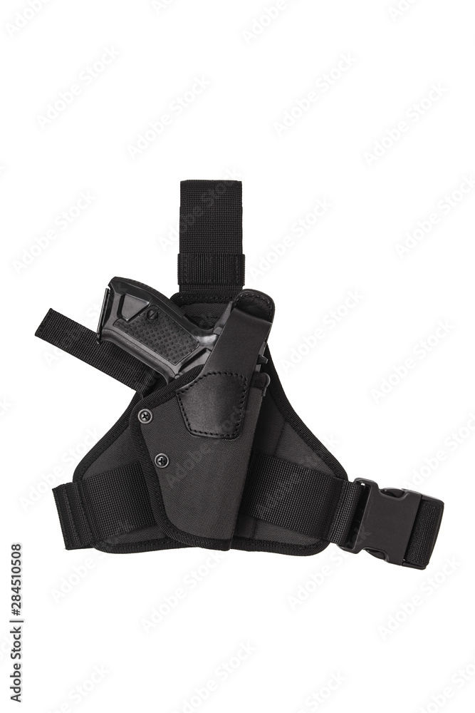 Black modern holster for a gun isolate on a white background. Black modern holster for a gun isolate on a white background.