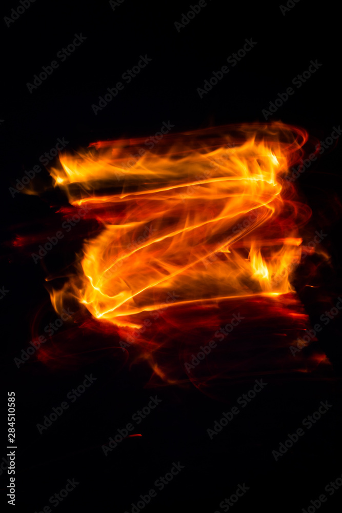Obraz premium fire burns on a dark background