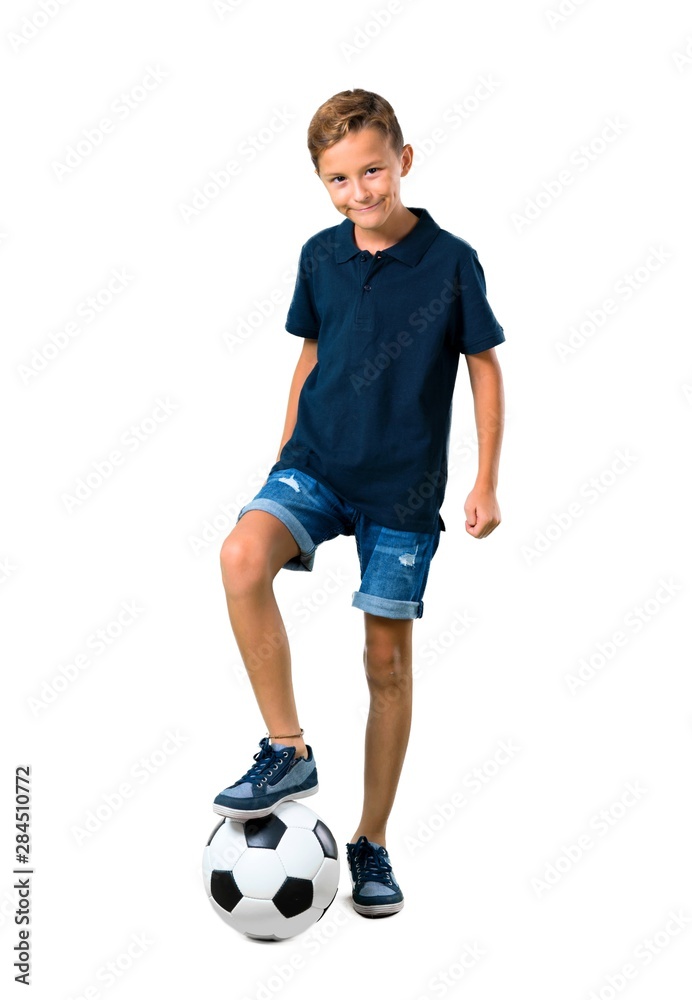 Little kid playing soccer on isolated white background Little kid playing soccer on isolated white background