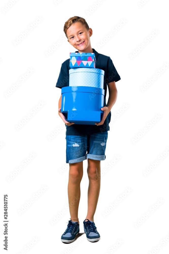 Little kid holding a gifts on isolated white background Little kid holding a gifts on isolated white background