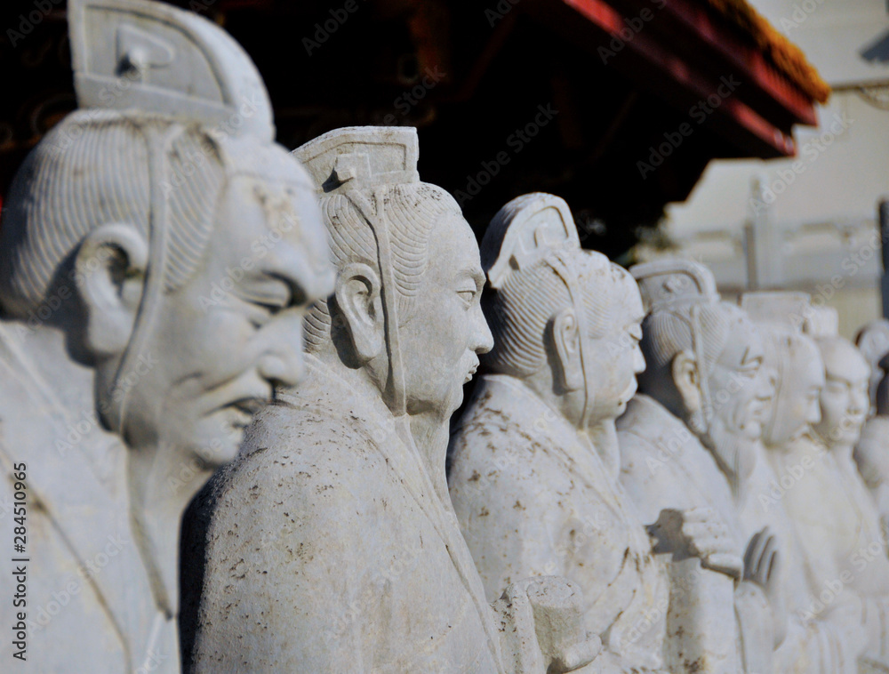 Obraz premium Life-size stone statues of several Chinese sages are on display at the Nagasaki Confucian Shrine, in Nagasaki, southern Japan.