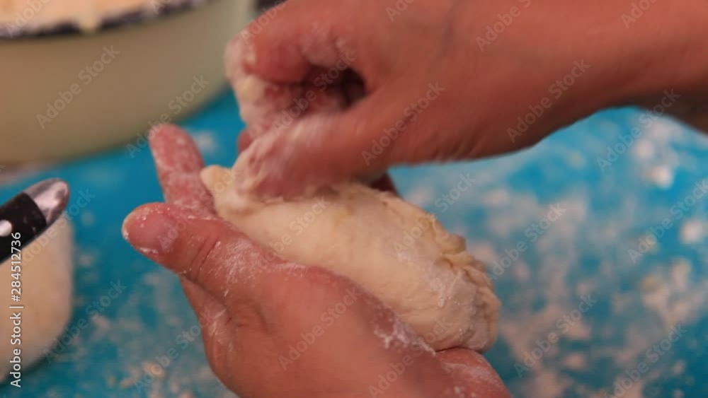 Cooking. Dough pie. Cooking from the dough. Cooking Cooking pies. Pie. Dough. Cooking. Cooking. Kitchen. Food. Close-up.