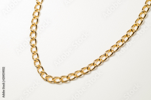 Golden chain isolated on white
