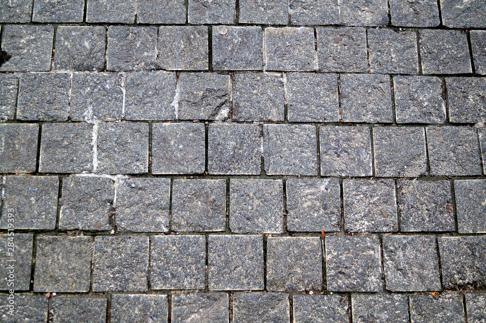 Street tile of gray color from small pebbles. Street tile of gray color from small pebbles.