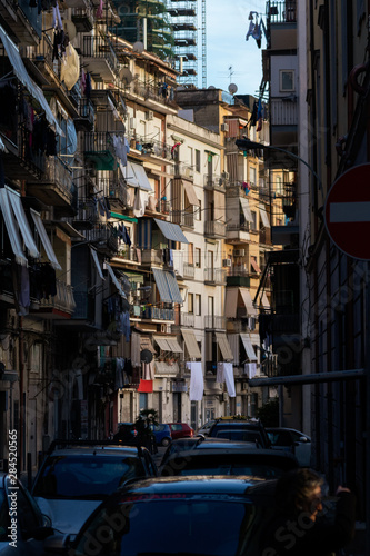 Naples old town in sunset. Traditional italian narrow alley. Naples downtown with small apartments and balconies. © Szabolcs