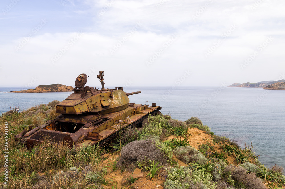 Abandoned old rusty tank on the dunes of Lemnos island, Greece