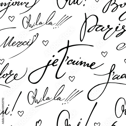 Vector seamless pattern with french words and simple hearts. Hand written lettering. Paris, bonjour, mercy, oh la la, oui.